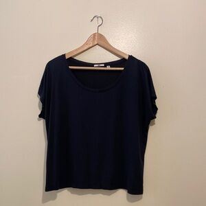 Uniqlo navy top . Size Xs.